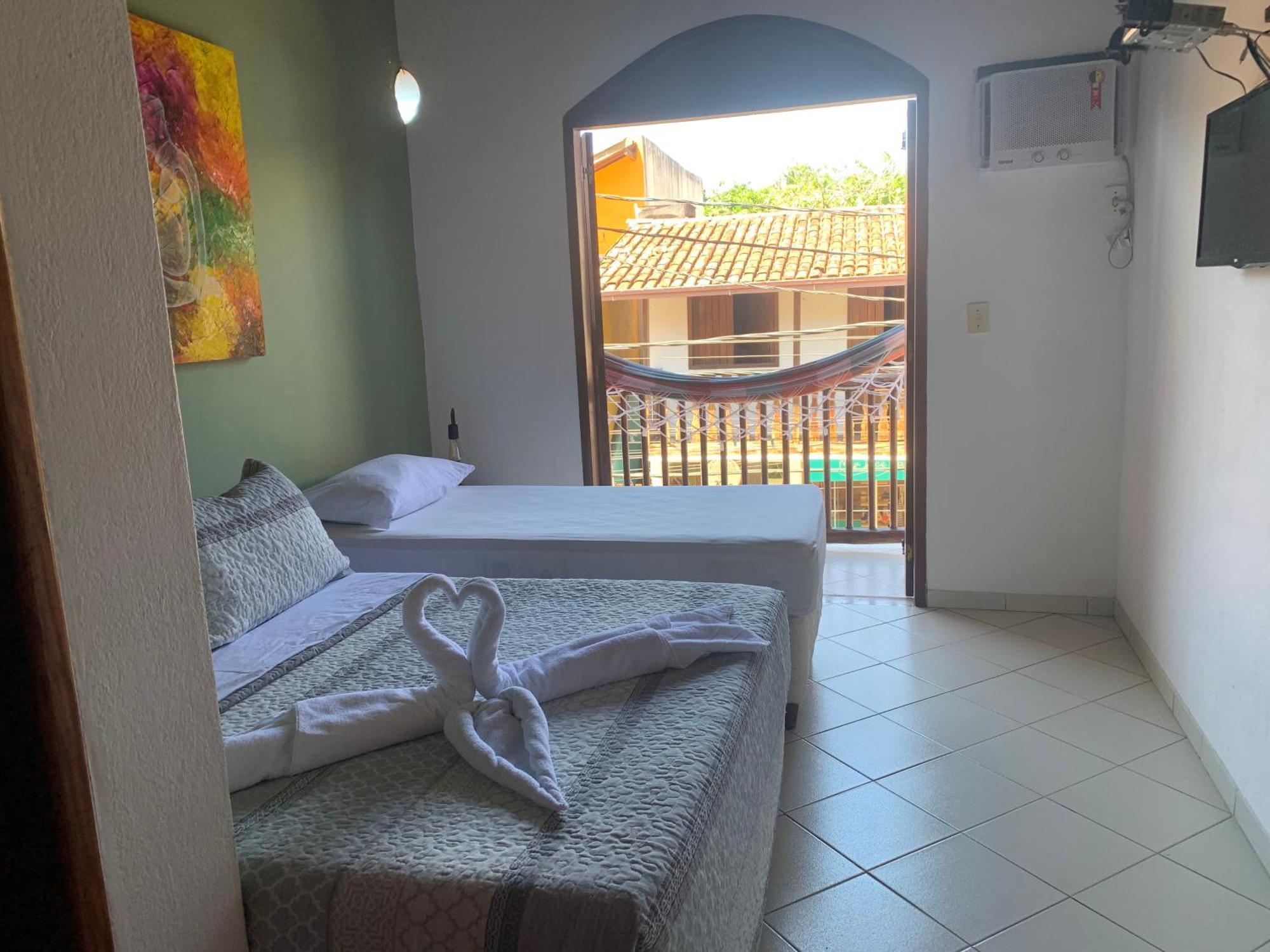 Quarto Triplo com Varanda
